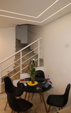 Casa à venda com 95m², 3 quartos e 2 vagasSala