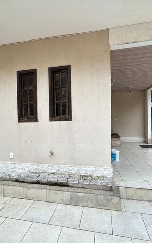 Casa à venda com 121m², 3 quartos e 2 vagasFachada