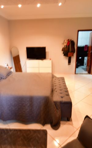 Casa à venda com 342m², 4 quartos e 4 vagasQuarto 4 - Suíte