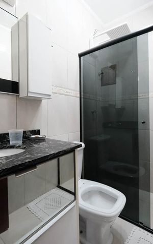 Casa à venda com 100m², 2 quartos e 2 vagasSuíte 2