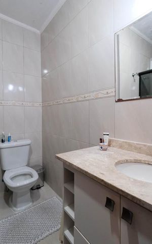 Casa à venda com 100m², 2 quartos e 2 vagasSuíte 1