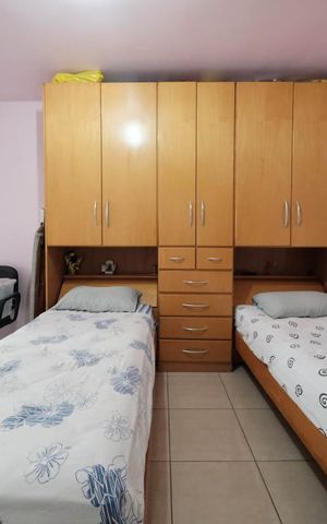 Casa à venda com 100m², 2 quartos e 2 vagasSuíte 2