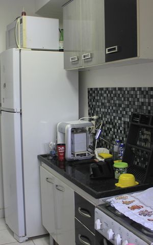 Apartamento à venda com 50m², 2 quartos e 1 vagaCozinha com lavanderia 
