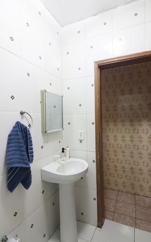 Casa à venda com 214m², 4 quartos e 2 vagasBanheiro 4
