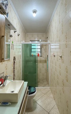 Casa à venda com 100m², 3 quartos e 2 vagas Casa à venda com 100m², 3 quartos e 2 vagasBanheiro Social
