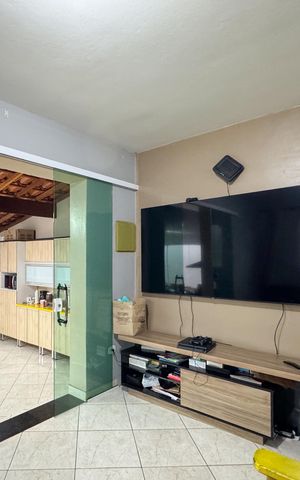 Casa à venda com 100m², 3 quartos e 2 vagas Casa à venda com 100m², 3 quartos e 2 vagasSala