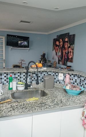 Casa à venda com 120m², 3 quartos e 2 vagas Casa à venda com 120m², 3 quartos e 2 vagasCozinha