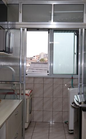 Apartamento à venda com 60m², 2 quartos e 1 vagaCozinha e Área de Serviço