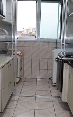 Apartamento à venda com 60m², 2 quartos e 1 vagaCozinha e Área de Serviço