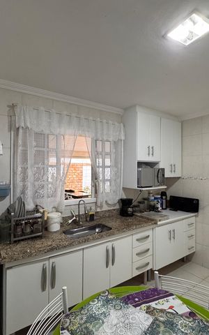 Casa de condomínio para alugar com 180m², 3 quartos e 2 vagasCozinha e Área de Serviço