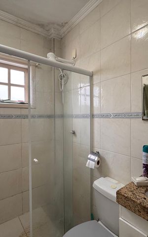 Casa de condomínio para alugar com 180m², 3 quartos e 2 vagasSuíte 1 - Banheiro