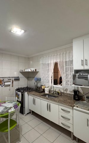 Casa de condomínio para alugar com 180m², 3 quartos e 2 vagasCozinha e Área de Serviço