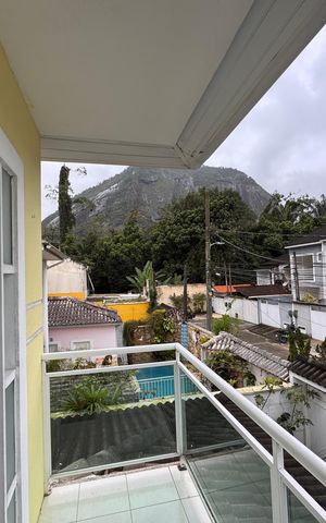 Casa de condomínio para alugar com 180m², 3 quartos e 2 vagasSuíte 1 - Varanda