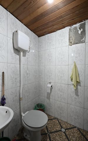 Casa à venda com 179m², 2 quartos e 5 vagasBanheiro 1
