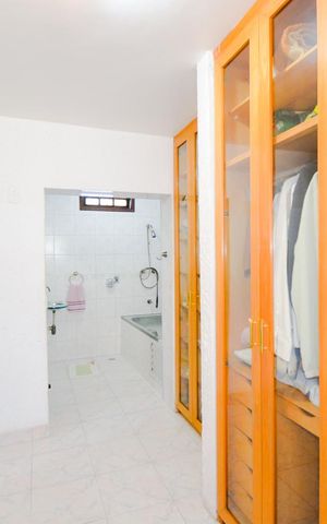 Casa à venda com 230m², 4 quartos e 2 vagasCloset da suíte