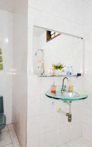 Casa à venda com 230m², 4 quartos e 2 vagasBanheiro da Suíte