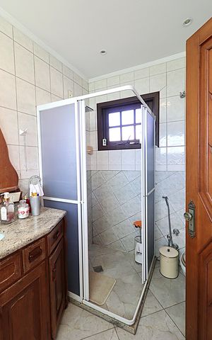 Casa à venda com 115m², 3 quartos e 2 vagasBanheiro da Suíte