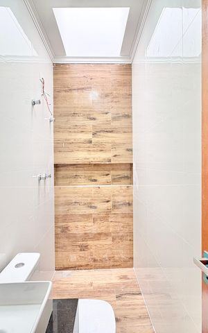 Casa à venda com 140m², 3 quartos e 2 vagas Casa à venda com 140m², 3 quartos e 2 vagasBanheiro