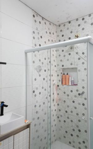 Casa à venda com 70m², 4 quartos e sem vagaBanheiro da Suíte