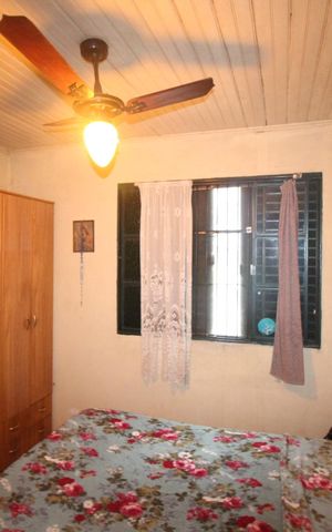 Casa à venda com 119m², 4 quartos e 2 vagasQuarto 1
