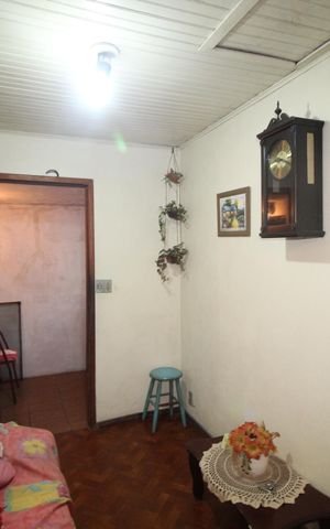Casa à venda com 119m², 4 quartos e 2 vagasSala