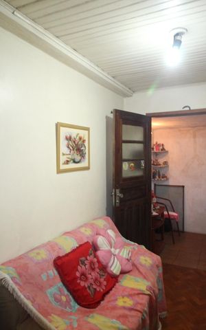 Casa à venda com 119m², 4 quartos e 2 vagasSala