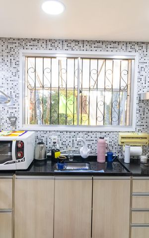 Casa à venda com 141m², 2 quartos e 4 vagas Casa à venda com 141m², 2 quartos e 4 vagasCozinha