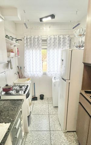 Apartamento à venda com 52m², 2 quartos e 1 vaga Apartamento à venda com 52m², 2 quartos e 1 vagaCozinha e Área de Serviço