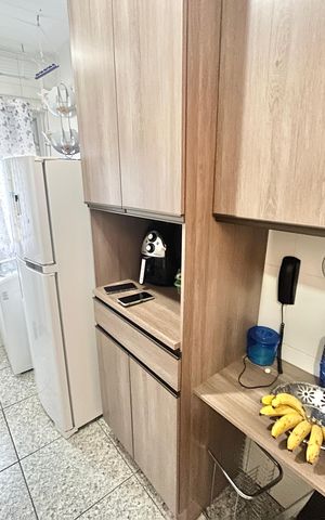 Apartamento à venda com 52m², 2 quartos e 1 vaga Apartamento à venda com 52m², 2 quartos e 1 vagaCozinha e Área de Serviço