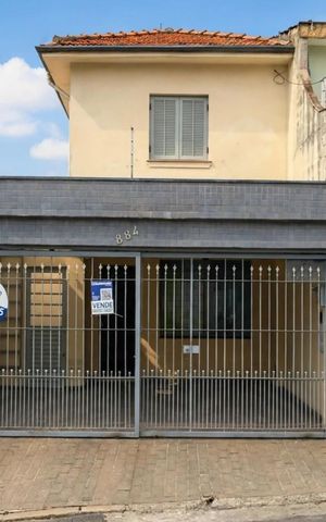Casa à venda com 169m², 3 quartos e 2 vagas Casa à venda com 169m², 3 quartos e 2 vagasFachada + Placa