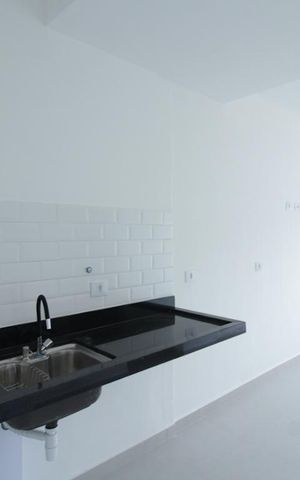 Studio à venda com 44m², 2 quartos e 1 vaga Studio à venda com 44m², 2 quartos e 1 vagaCozinha e Área de Serviço