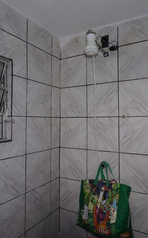 Casa à venda com 99m², 2 quartos e sem vagaBanheiro externo