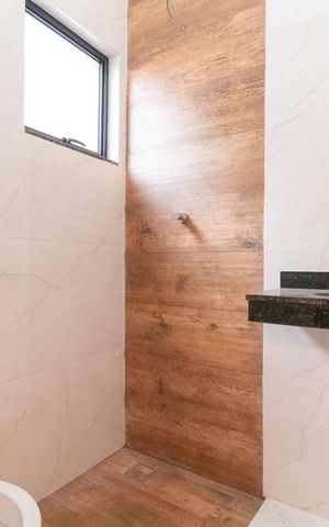 Casa à venda com 120m², 2 quartos e 2 vagas Casa à venda com 120m², 2 quartos e 2 vagasBanheiro da Suíte 1