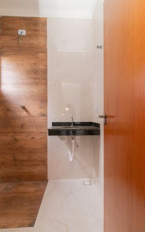 Casa à venda com 120m², 2 quartos e 2 vagas Casa à venda com 120m², 2 quartos e 2 vagasBanheiro da Suíte 1