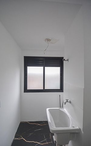 Apartamento à venda com 43m², 2 quartos e 1 vaga Apartamento à venda com 43m², 2 quartos e 1 vagaCozinha e Área de Serviço