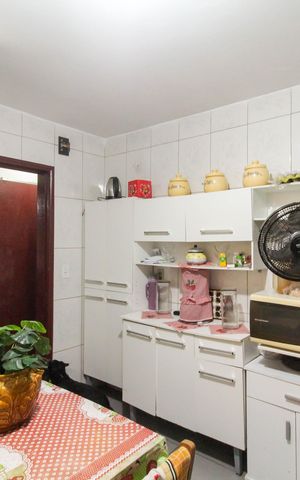 Casa à venda com 130m², 3 quartos e 2 vagas Casa à venda com 130m², 3 quartos e 2 vagasCozinha