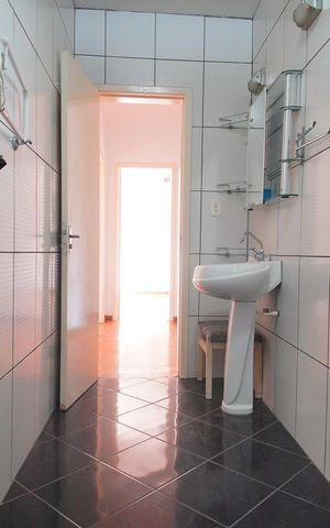 Casa para alugar com 208m², 4 quartos e 2 vagasBanheiro 1