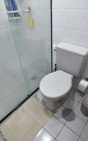Apartamento à venda com 66m², 2 quartos e 2 vagasBanheiro social