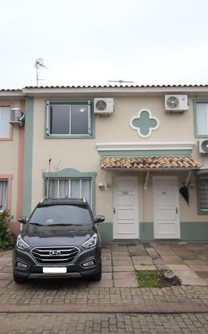 Casa de condomínio à venda com 102m², 2 quartos e 1 vagaFachada