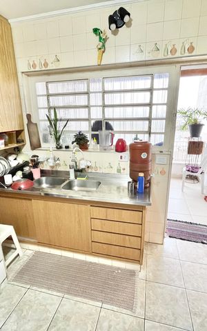 Casa à venda com 189m², 4 quartos e 4 vagas Casa à venda com 189m², 4 quartos e 4 vagasCozinha