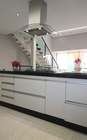 Casa de condomínio para alugar com 250m², 3 quartos e 4 vagasCozinha