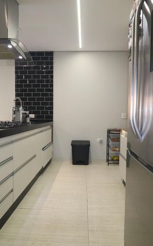 Casa de condomínio para alugar com 250m², 3 quartos e 4 vagasCozinha