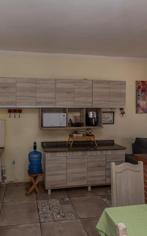 Casa à venda com 80m², 2 quartos e 2 vagas Casa à venda com 80m², 2 quartos e 2 vagasCozinha e Sala de Jantar