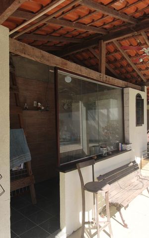 Casa de condomínio à venda com 176m², 2 quartos e 1 vagaQuintal