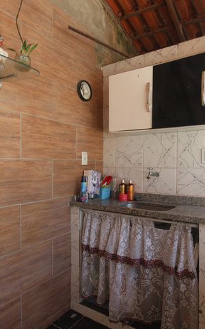 Casa de condomínio à venda com 176m², 2 quartos e 1 vagaQuintal - Cozinha