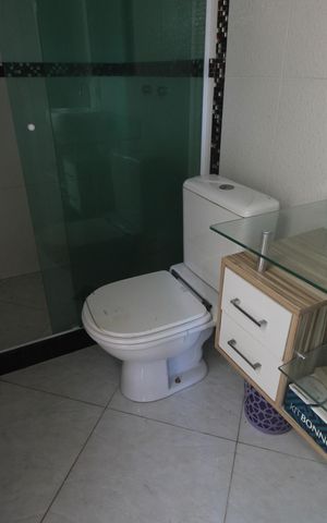 Casa de condomínio à venda com 176m², 2 quartos e 1 vagaBanheiro da suíte 1