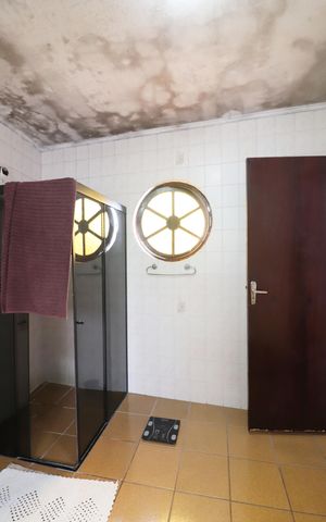 Casa à venda com 180m², 3 quartos e 2 vagasQuarto 1 - Suíte Banheiro 