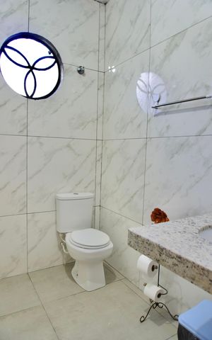 Casa à venda com 75m², 3 quartos e sem vaga Casa à venda com 75m², 3 quartos e sem vagaBanheiro