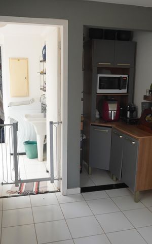 Casa de condomínio para alugar com 183m², 4 quartos e 2 vagasCozinha
