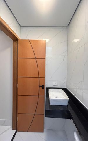 Casa à venda com 100m², 3 quartos e 2 vagas Casa à venda com 100m², 3 quartos e 2 vagasBanheiro da Suíte 2